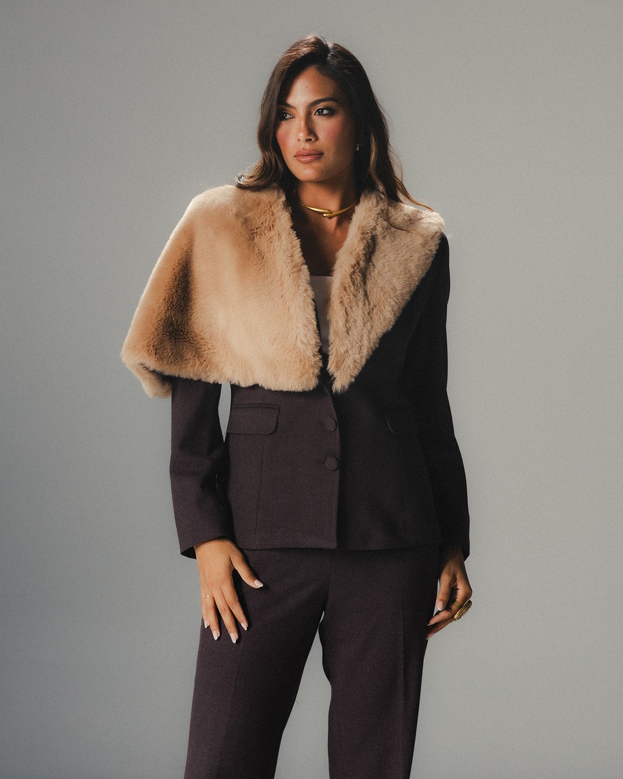 Model wearing the MYSHA Espresso brown blazer and matching tailored trousers for a complete power suit look