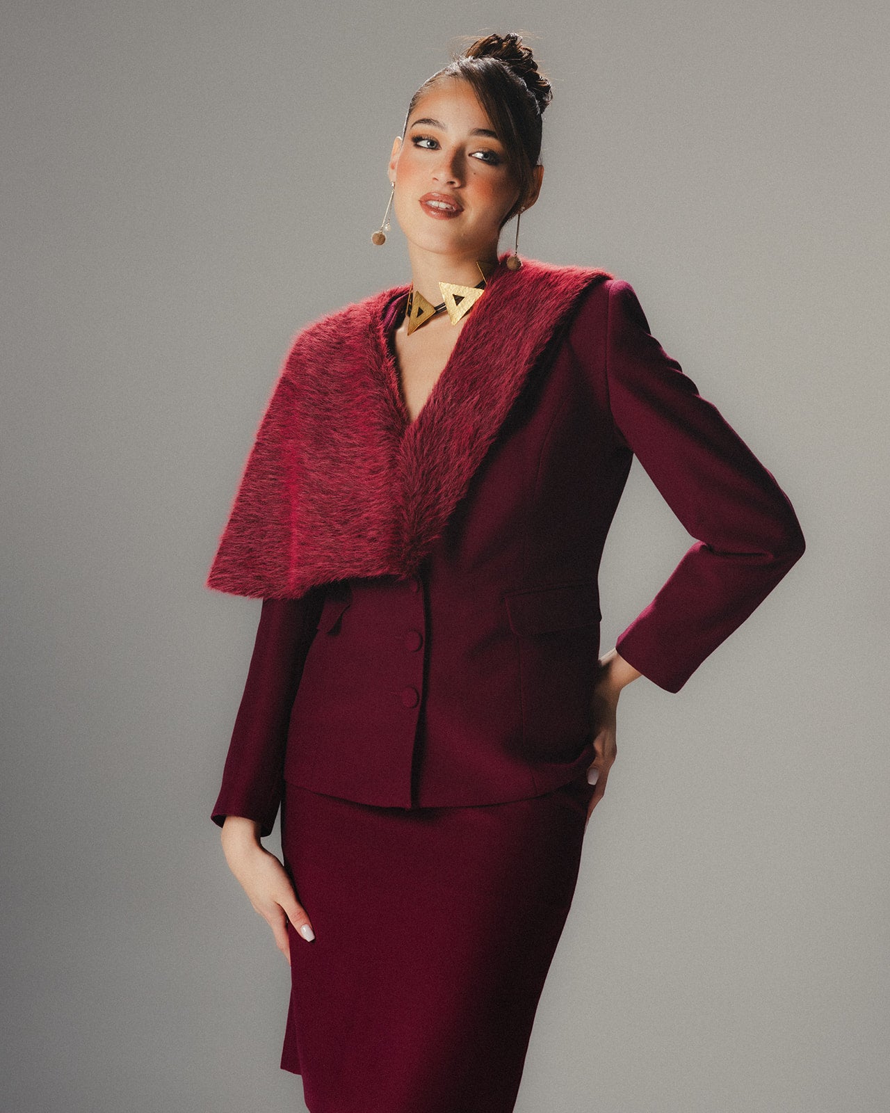 Model wearing MYSHA Bordeaux blazer with detachable fur collar with Bordeaux pencil skirt - Front view